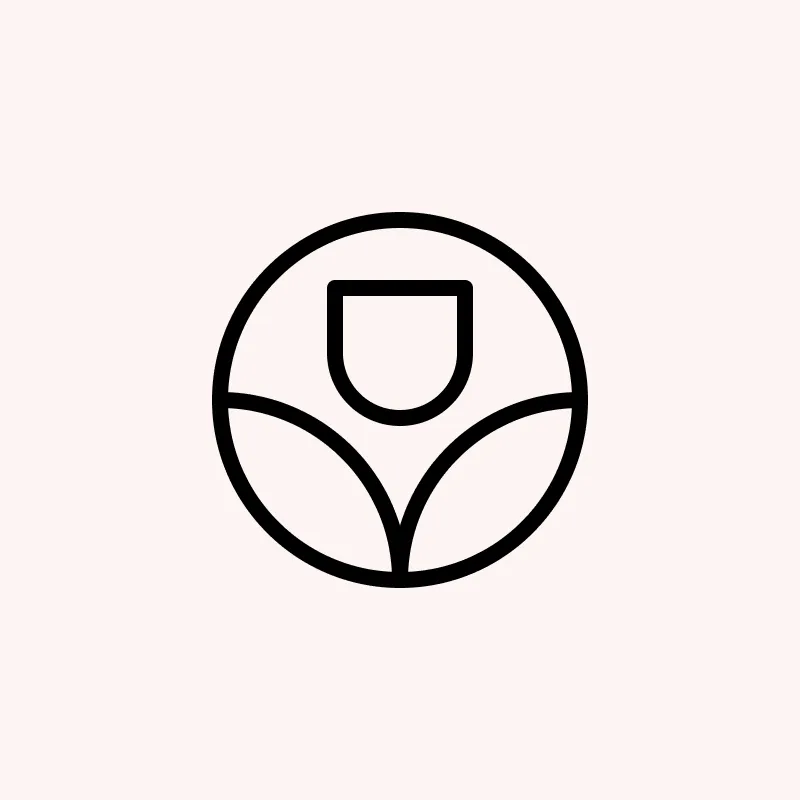Minimalist black and white logo of a plant in a pot, designed within a circular frame.